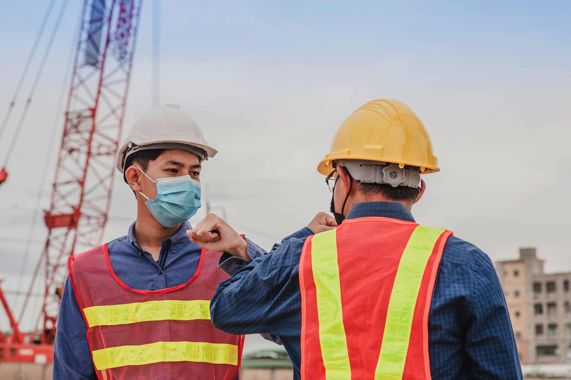 workers wearing mask on construction site