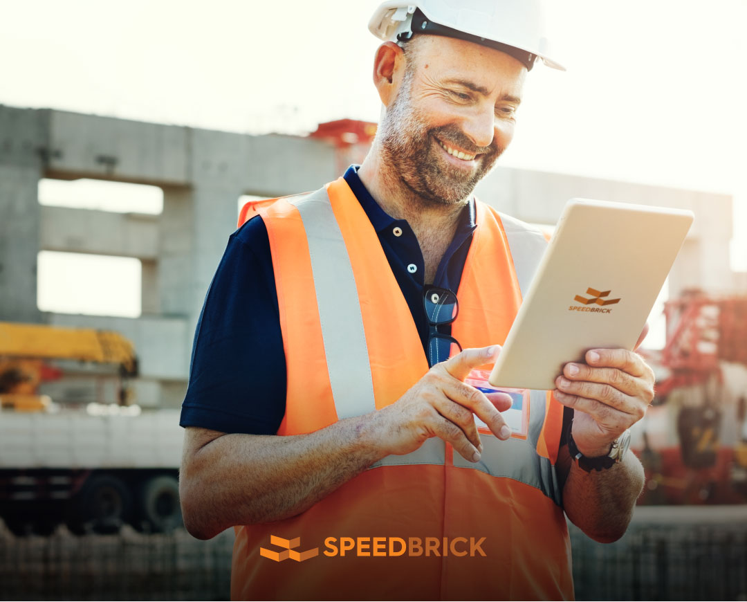 contractor using a tablet in construction site